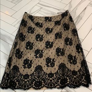 Moschino black lace skirt with nude underlay